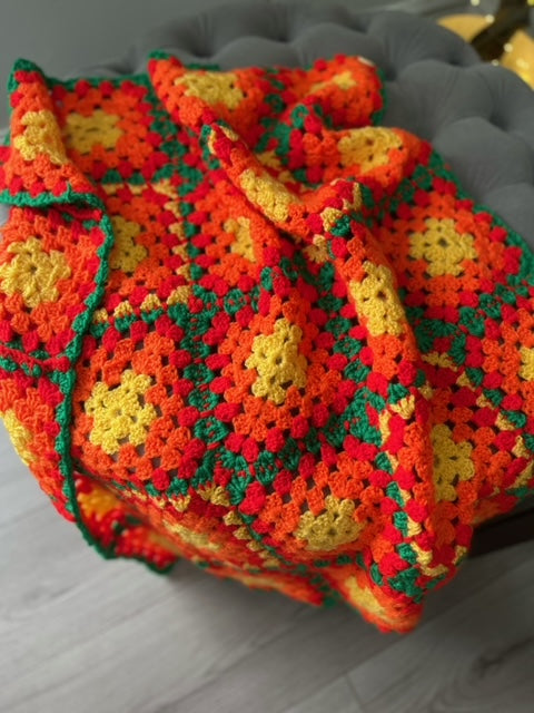 Hand Made Knitted Blanket in Orange, Yellow, Red and Green Oh So Crafty