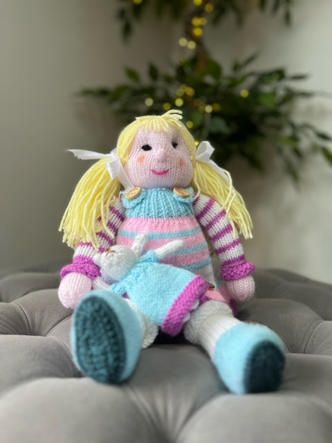 Hand Made Knitted Girl Doll with Blonde Hair Holding a Bunny Toy Oh So Crafty